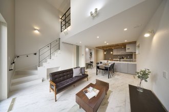 開放的な吹き抜けと回遊動線で家族がのびのび暮らす家